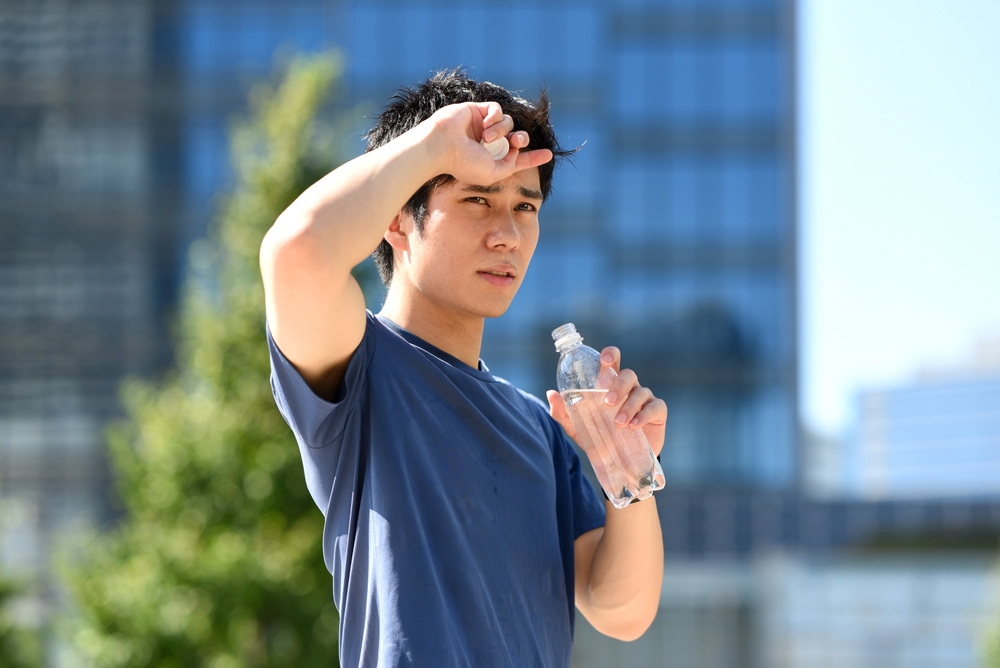 Japanese wellbeing Japanese runner with drink